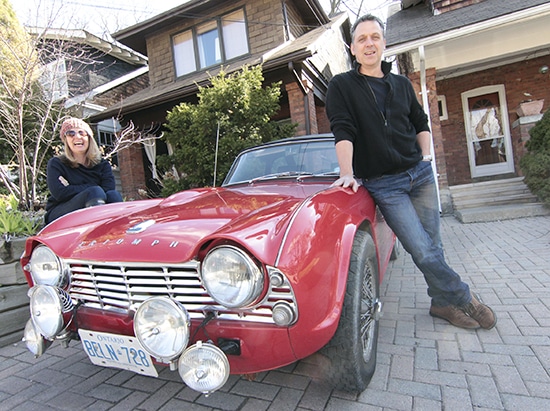 Tim Burgess and Jan Frolic pose for a “before” shot with their 1961 Triumph TR4 sports car, which they will drive some 7,200 km this August on a nine-day rally from Seattle to Alaska. Along the way, the Beach couple hopes to raise $5,000 for Princess Margaret Hospital. Anyone who wants to make a donation or track their progress on rally can find out more on the Facebook page called Jan & Tim’s Excellent Adventure. PHOTO: Andrew Hudson