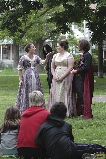 Desdemona (played by Melissa Beveridge, left) and Bianca (Andrea Cabeza, centre) share a laugh at Iago (James Soares, right) while Roderigo (Jonathan Dufour) looks on with a sinister grin during the June 11 opening of Bard in the Park's Othello at Norwood Park. PHOTO: Andrew Hudson