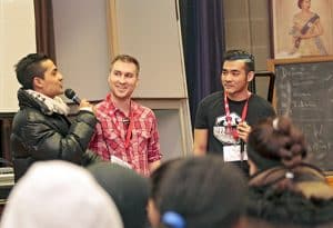 Filmmaker James Brylowski, centre, listens to an impromptu rap by a student who quickly took up Brylowski's advice after a film screening at Greenwood Secondary school on Feb. 25. Brylowski, who wrote, directed and produced the mockumentary short A Mile in These Hooves, told students the best way to land work in film, music, and other careers is to just get started. “I think that’s what it’s about," he said. "Pick up a camera, shoot stuff and show people what you can do.” PHOTO: Andrew Hudson