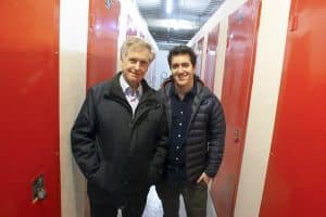 Peter and David Segal, father and son, inside the halls of their family business, Migson Storage.