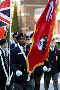 James Levine marches in the colour guard of Royal Canadian Legion, Baron Byng Beaches branch (1/42), during the  Remembrance Day parade to the Kew Gardens cenotaph on Nov. 11. This year commemorated the start of the First World War. PHOTO: Andrew Hudson