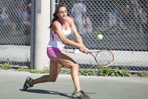 Sofija Zecevic makes a return on the way to defeating Ines Milosevic at 2014 Junior Closed Provincial Championships at Kew Gardens. FILE PHOTO