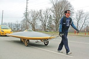 Marcelo Da Luz pulls solar powered car