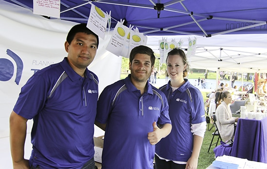 From left to right, planners Jason Tsang, Rafael Mejia-Ortiz and Emily Caldwell at a pop-up booth at the East Lynn Park farmer's market on Sept. 19. PHOTO: Andrew Hudson