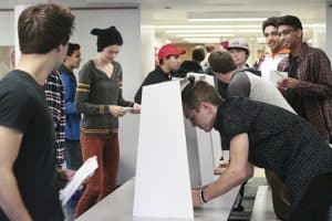 Malvern students cast Beaches-East York ballots in Student Vote, a mock federal election, on Oct. 16. Watching how quickly vote ran for all Grade 9 to 12 classes, principal Diane Sharpe said Elections Canada could learn from the student volunteers who set it up. PHOTO: Andrew Hudson