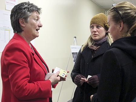 Ward 31 councillor Janet Davis, left, speaks with East End residents Meg De Bassecourt, centre, and Orla Kipling at a recent open house dealing with construction planned for Danforth Avenue between Woodbine and Victoria Park. PHOTO: Yasmin Soul