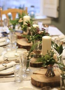 Repurposed wood, and individualized floral arrangements can add variety and interest to holiday place settings at a dinner party. PHOTO: NanneSpringer.com