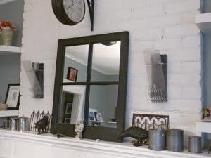 Items collected while travelling are highlighted in part by a white wall as a backdrop. PHOTO: Christine Roberts