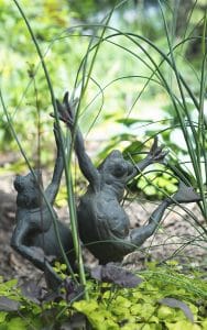 Sculptures are placed throughout the garden, some hiding in the shadows. PHOTO: Jon Muldoon