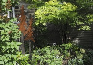 Sculpted trees mix with the real thing. PHOTO: Jon Muldoon