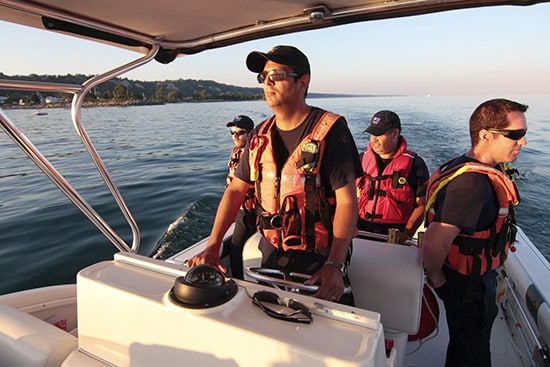 From left, Jeff Gauld, Petr Jago, Derek Cartier and Dan Barker patrol the waters off Bluffer’s Park with Toronto Search and Rescue on Sept. 16. After a four-year effort that including fundraising for a rescue boat and certifying with the Canadian Coast Guard Auxiliary, the all-volunteer marine rescue is now running patrols from the Rouge River to Ashbridges Bay. PHOTO: Andrew Hudson
